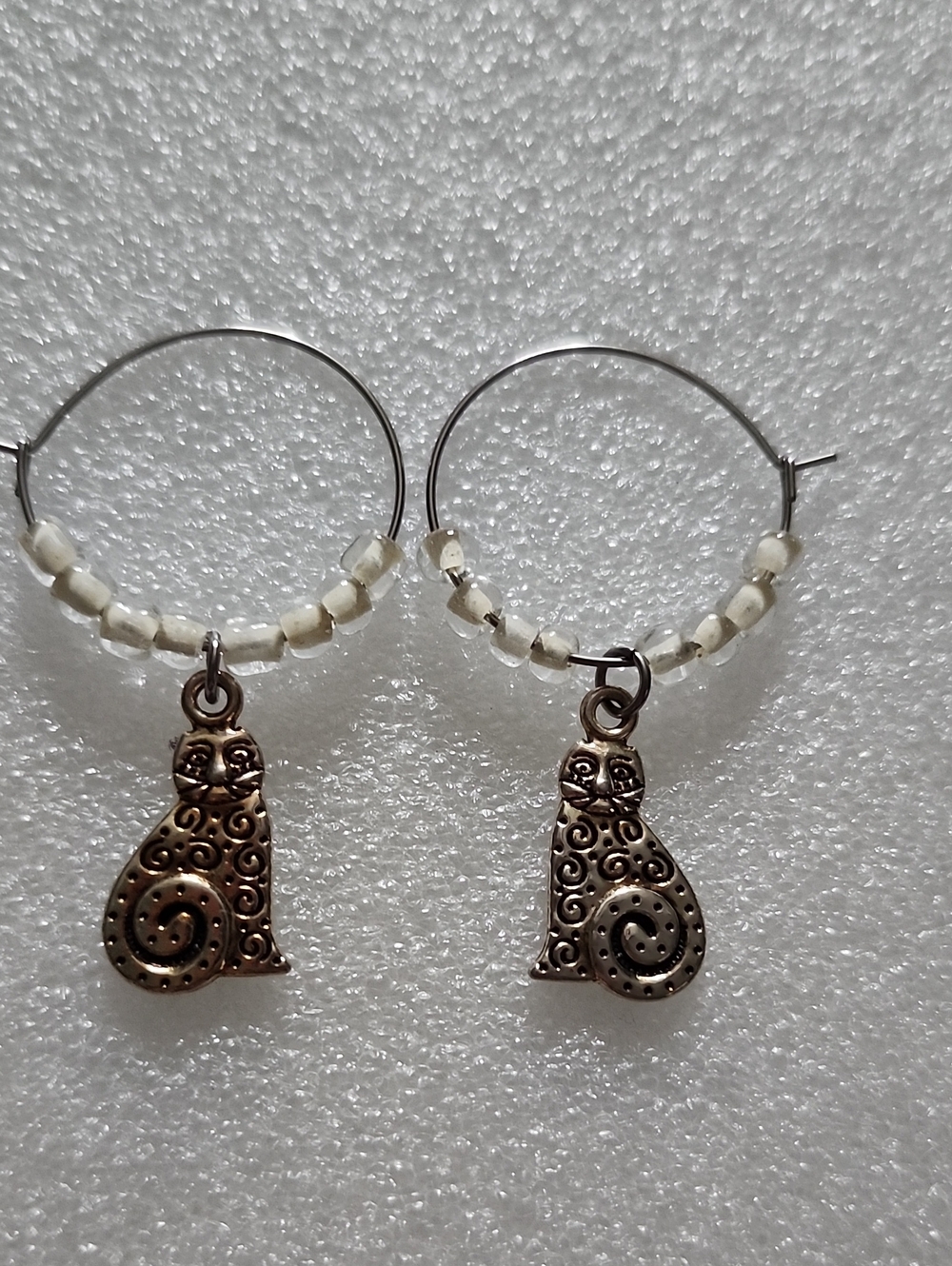 Hand Crafted Silver Hoops with Cream Beads & Bronze Cat Charms